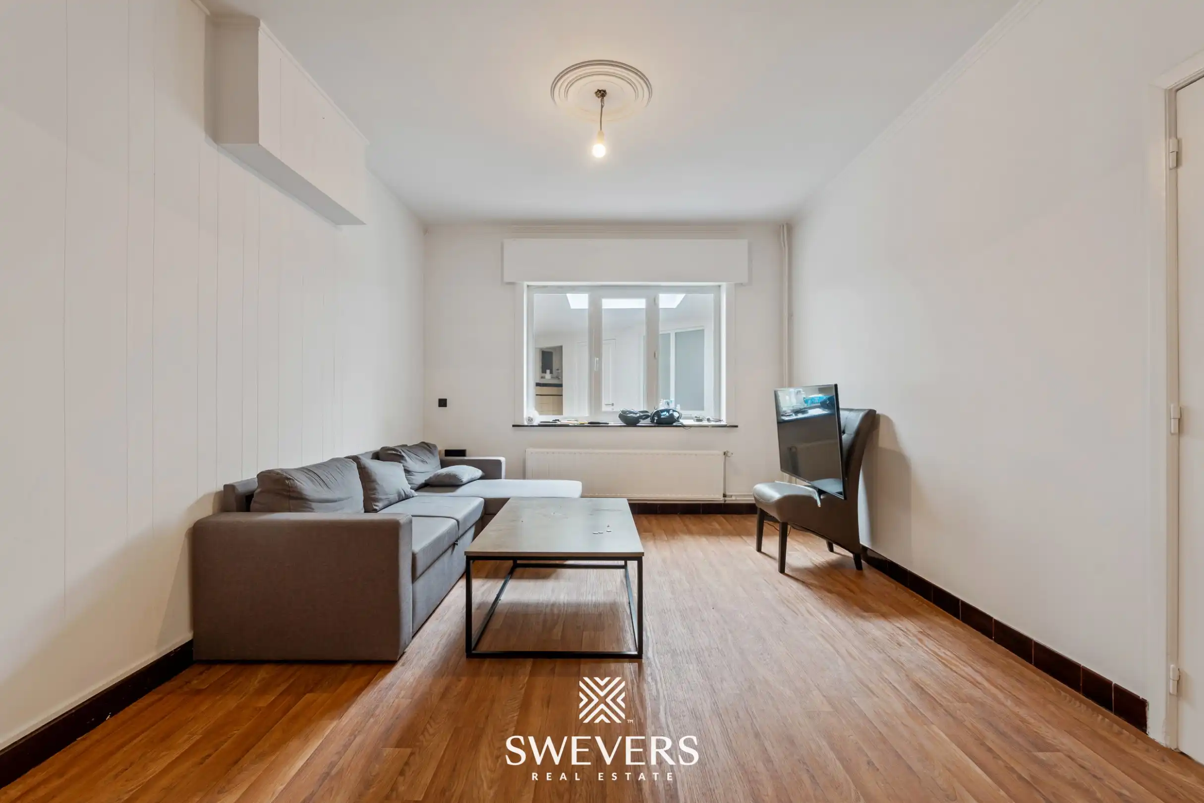 Te renoveren woning met 4 slaapkamers en 4 garages te Beringen foto 2