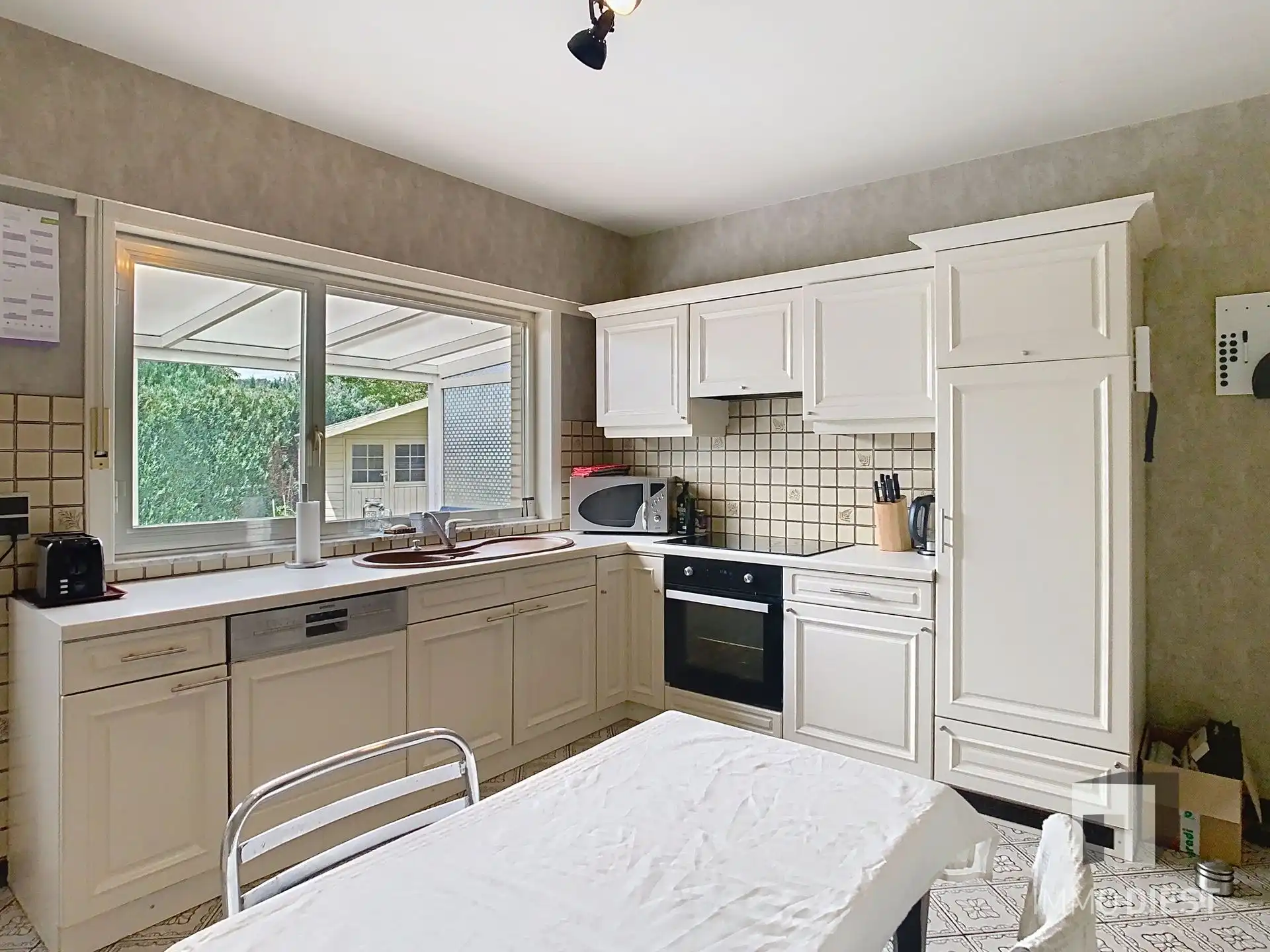 Gelijkvloerse instapklare woning met grote tuin op ca. 39a foto 14