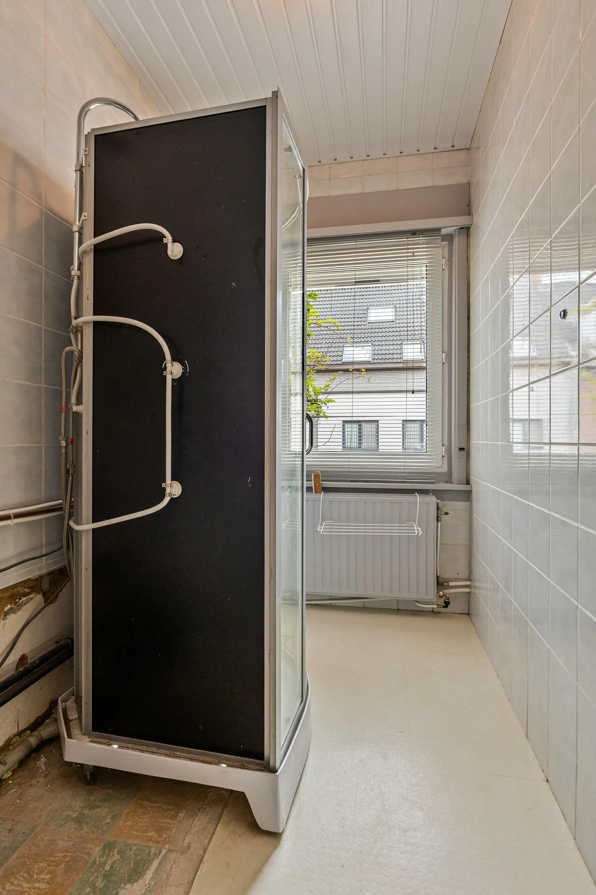 Huis met veel potentieel, tuin en garage te koop in Merksem foto 14