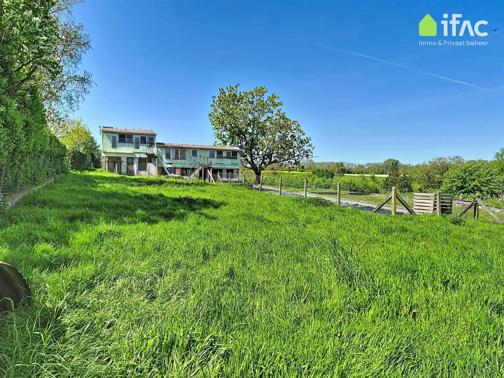 Te renoveren woning met recente ruime loods  foto 17