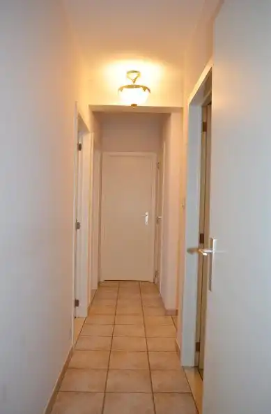 Ruim appartement met twee slpk's, terras en garage in centrum Beverlo foto 9