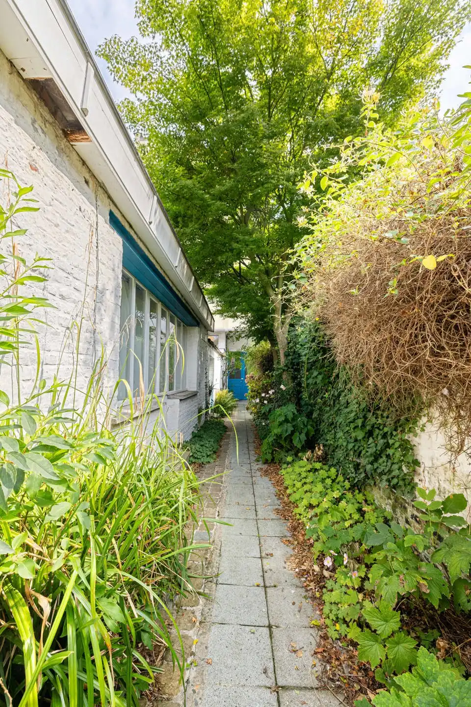 Begane grond 2 slaapkamers van ± 126 m² met tuin foto 11