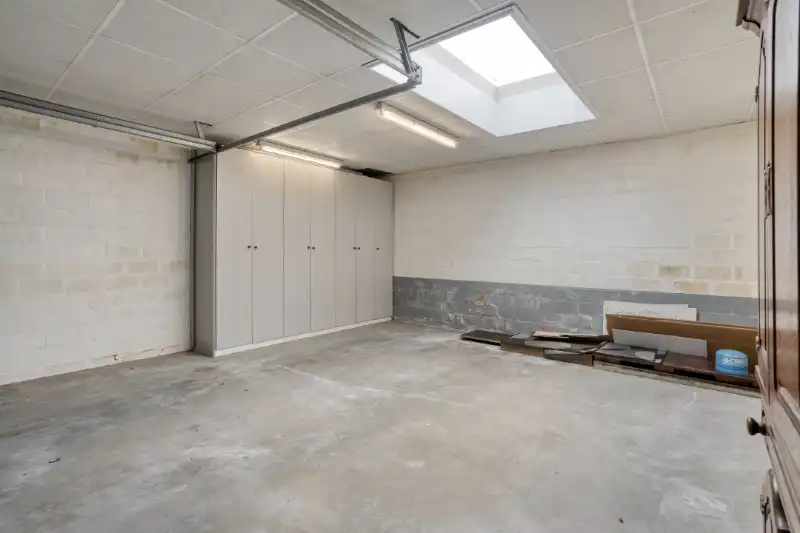 HALFOPEN BEBOUWING MET VEEL RENOVATIEPOTENTIEEL EN RUIM DAKTERRAS foto 13