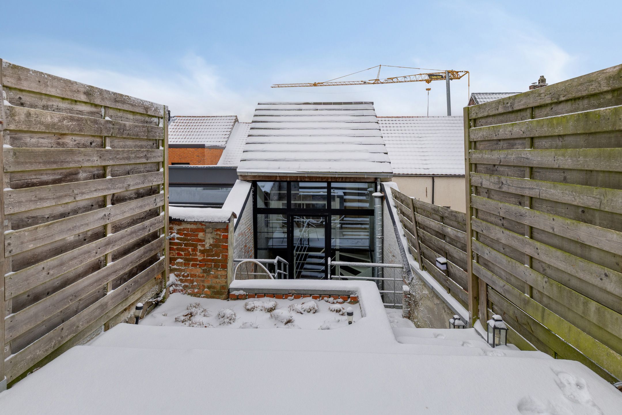 Instapklaar triplex appartement met terras en tuin foto 12