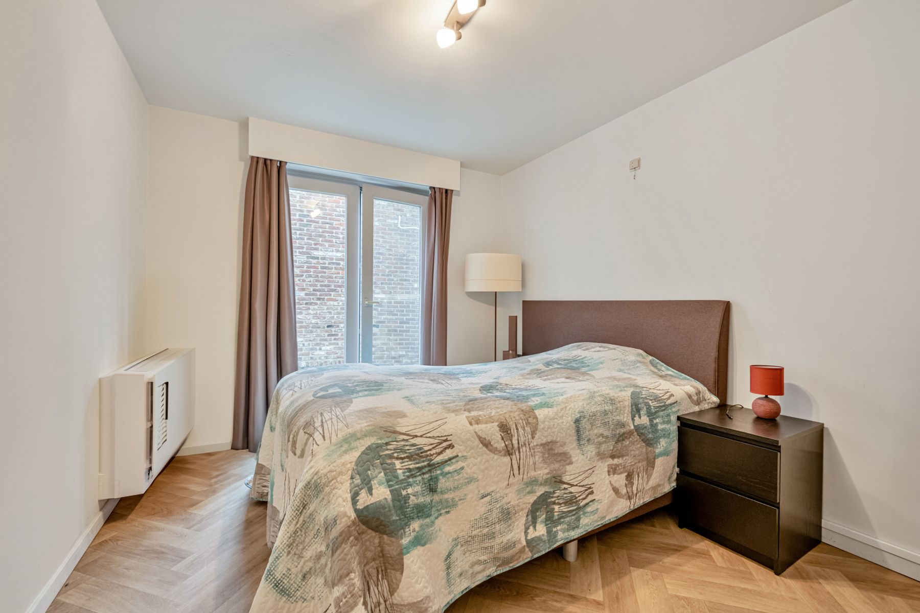 Gelijkvloers appartement met zonnig terras en aparte garage! foto 8