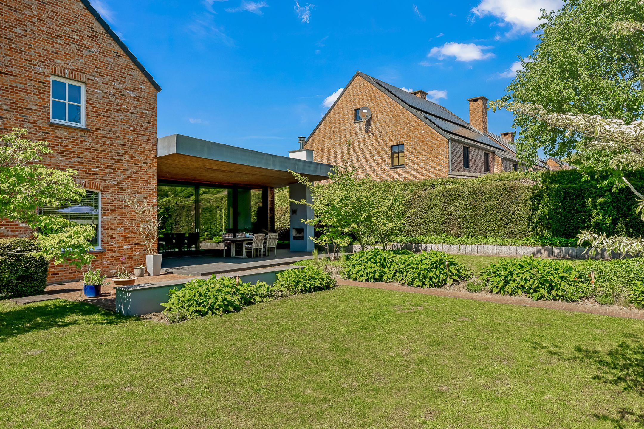 Instapklare woning met tuingerichte aanbouw foto 38