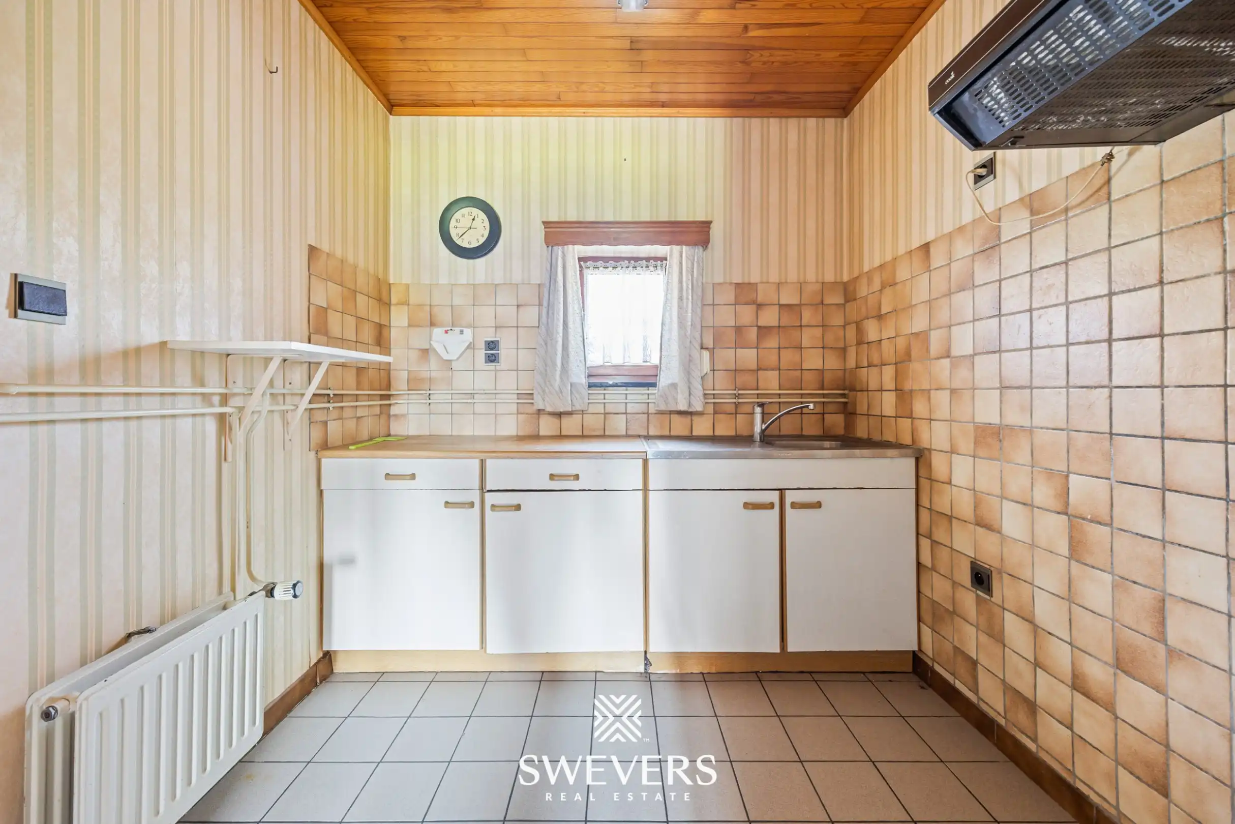 Vrijstaande woning met groot perceel en enorm renovatiepotentieel in Herk-de-Stad foto 13
