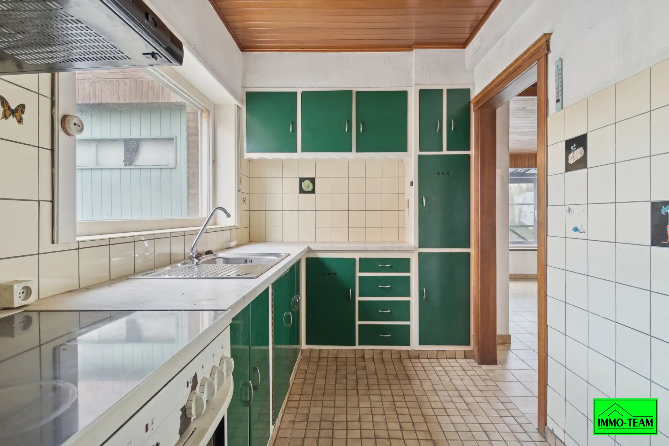 Te renoveren 4-gevel woning met garage en tuin foto 11