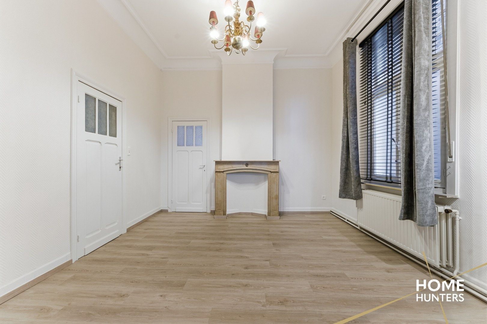 Ruim éénslaapkamer appartement met uniek zicht op het astridpark en de Sint Maartens Kathedraal te Ieper foto 9