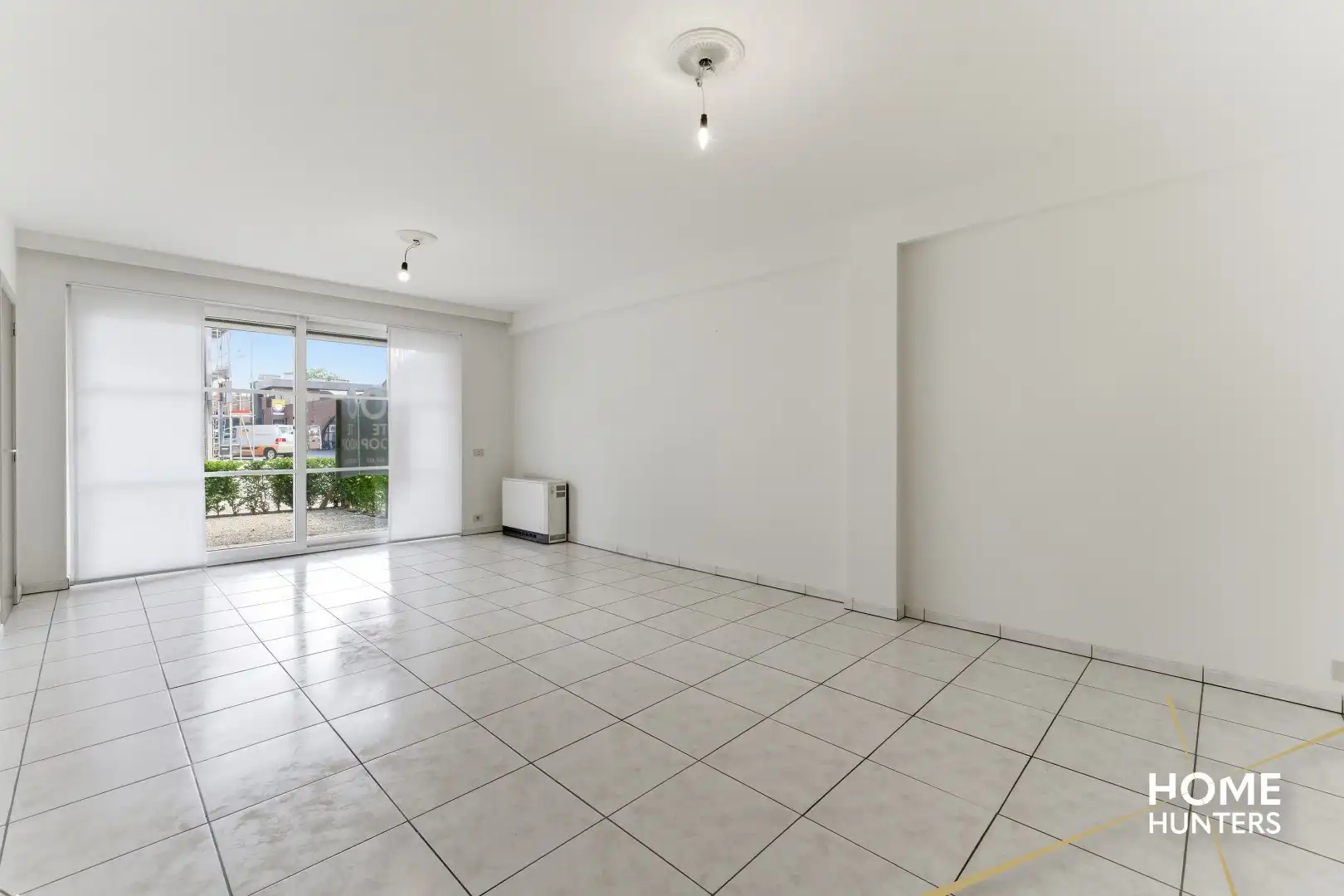 Instapklaar gelijkvloers appartement met 2 slaapkamers en ruime tuin foto 6