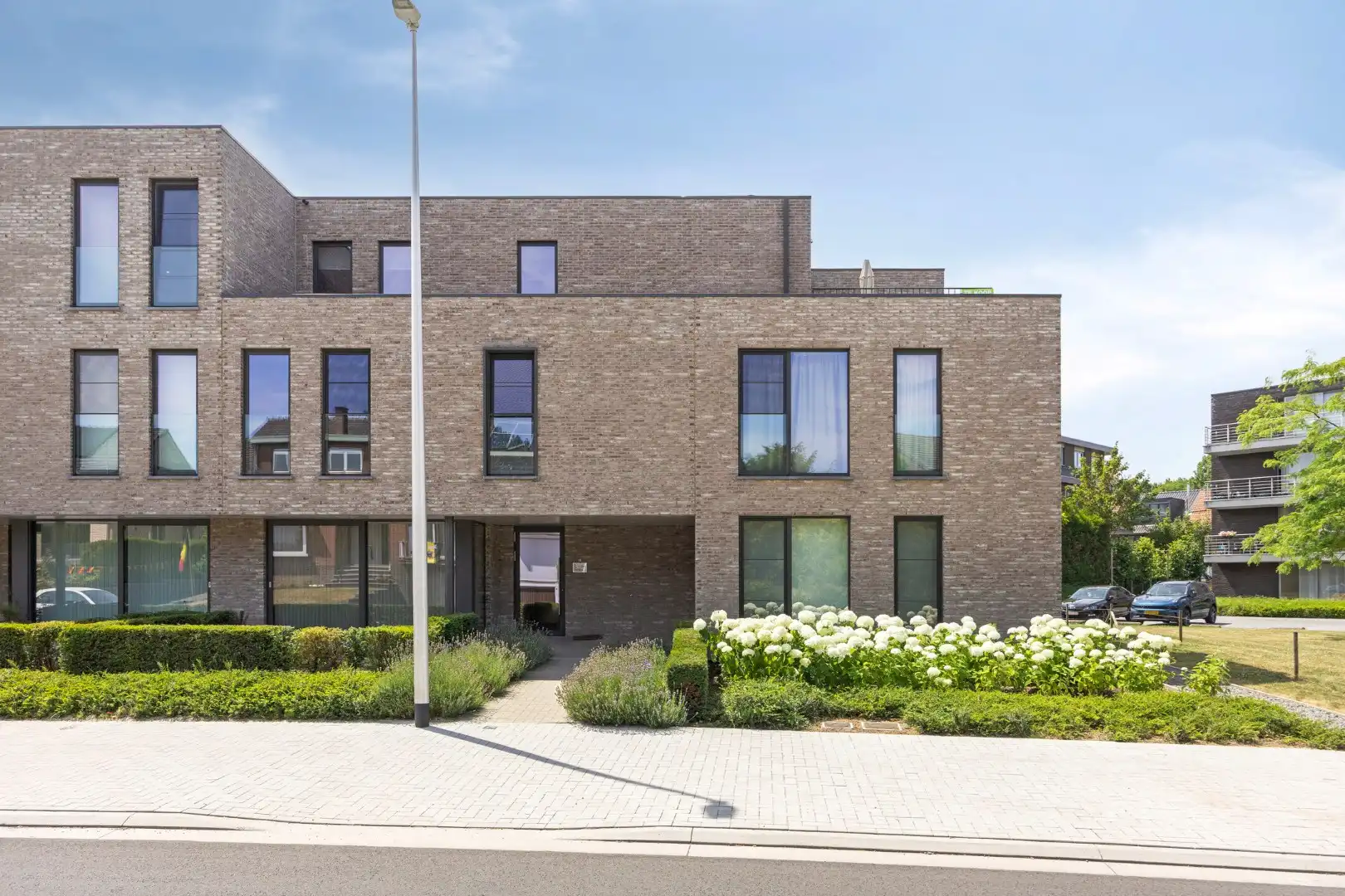 Standaard appartement met terras, lift en garage in het centrum van Tongeren - 2 slaapkamers, bouwjaar 2023, EPC-waarde 72.00, energielabel A, zonnige tuin op h foto 14