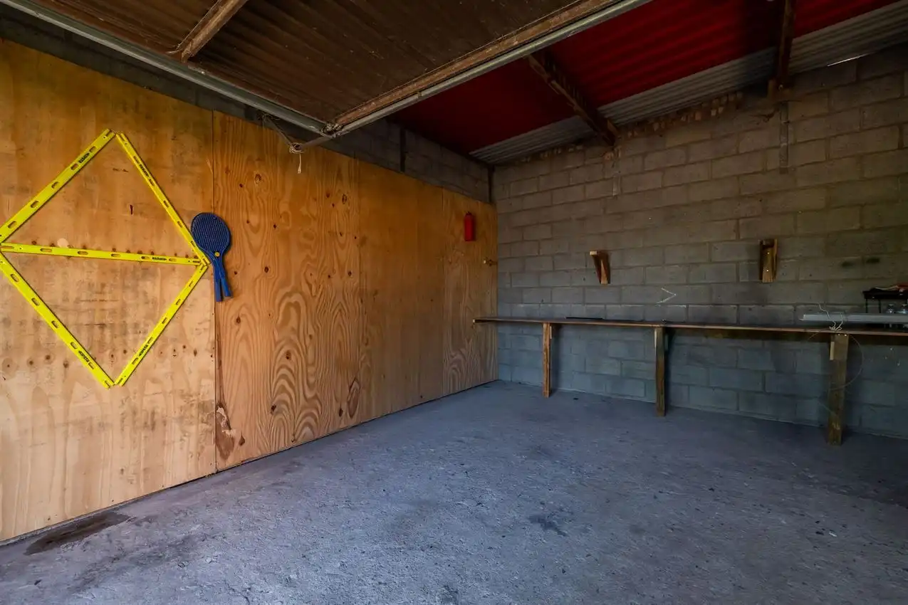 Verzorgde woning met 2 slpk., tuin en garage foto 28