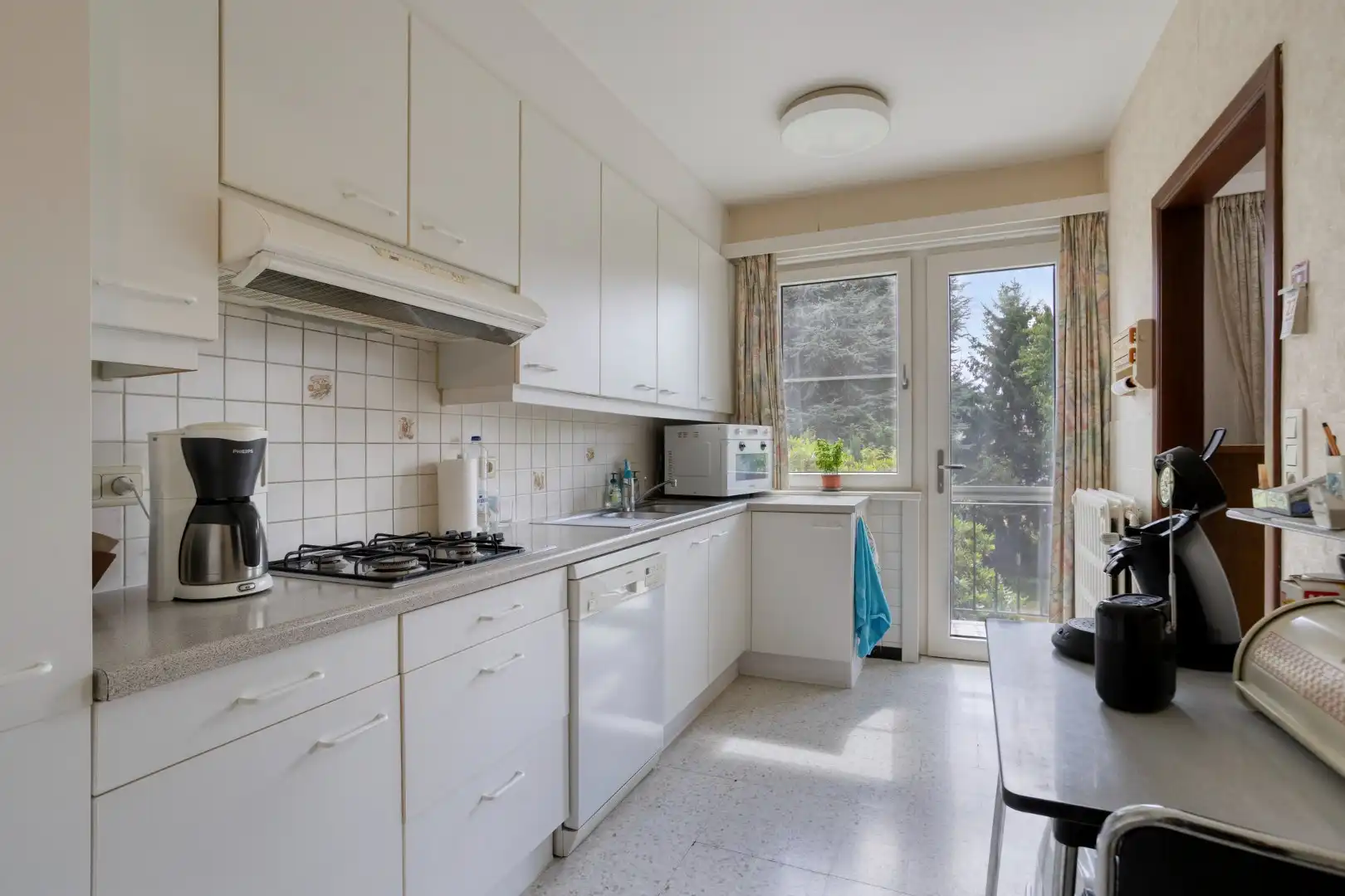 Opbrengsteigendom met tuin en 2 verhuurde appartementen in Wemmel foto 5