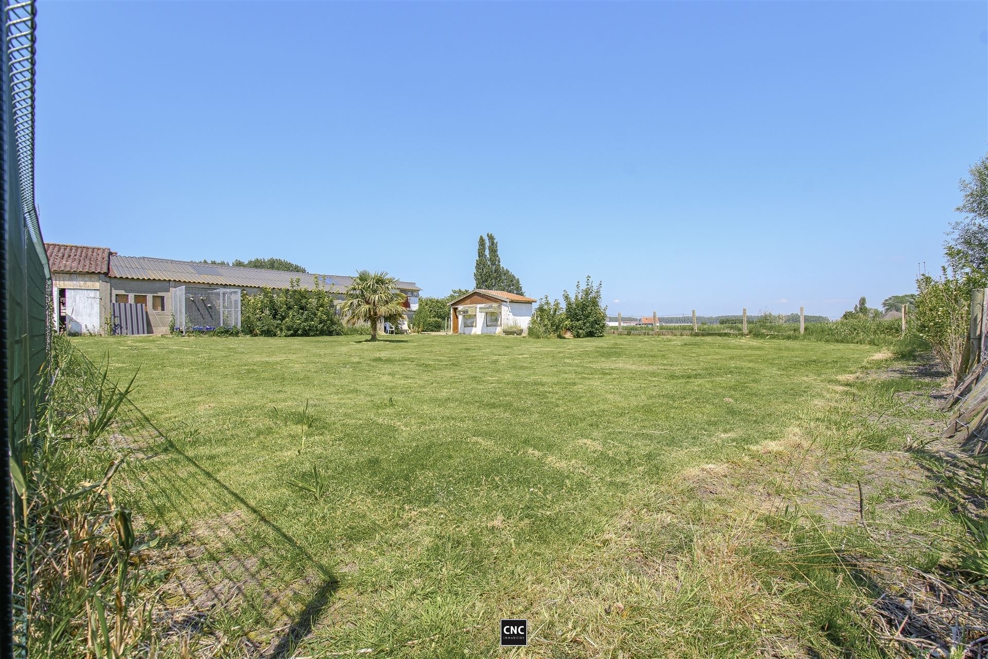 KANGOEROEWONINGEN met een uitgestrekte tuin, sfeervol terras met adembenemend uitzicht en royale loods met werkplaats. Maar liefst 28 meter gevelbreedte! foto 59