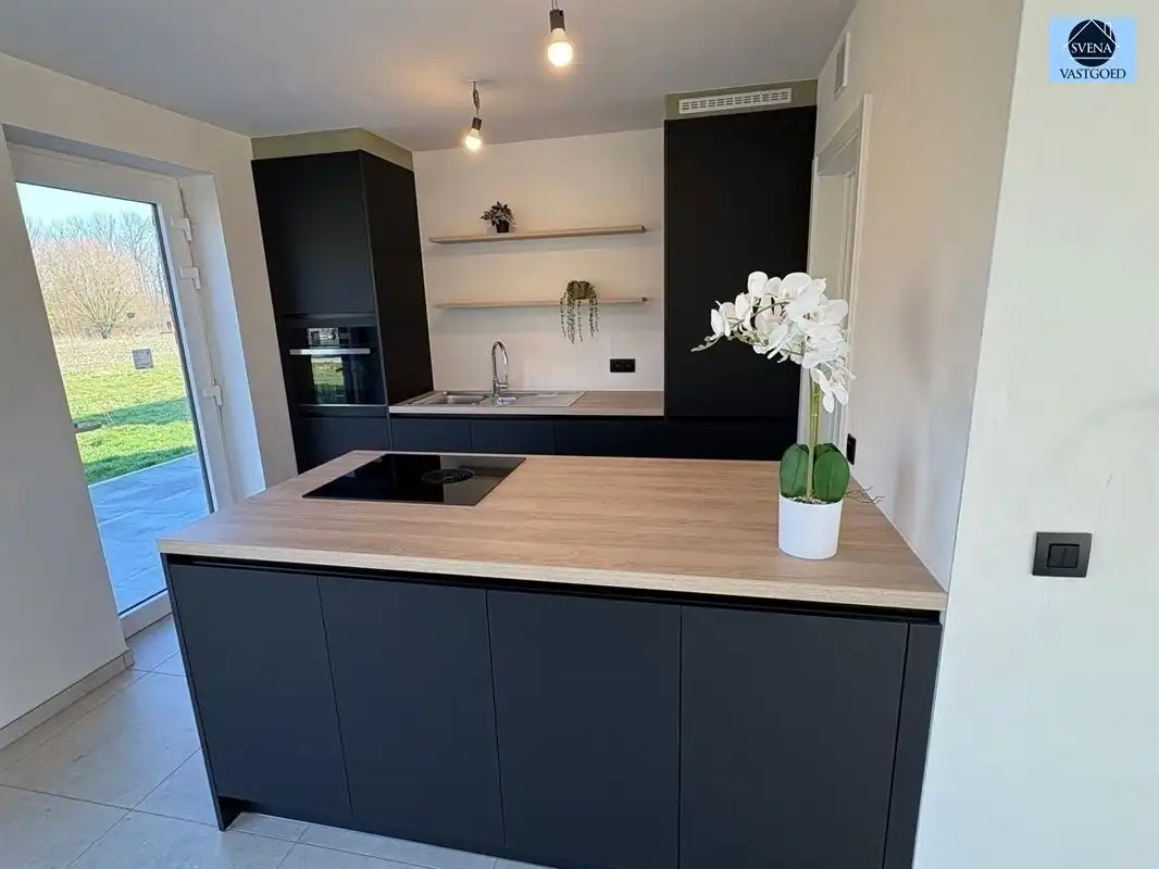  HALFOPEN NIEUWBOUWWONING MET 3 SLAAPKAMERS EN TUIN foto 7