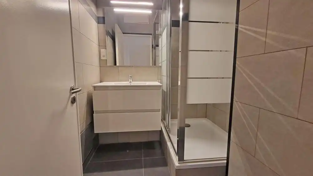 Ruim appartement met terras + Optie aankoop garagebox foto 12