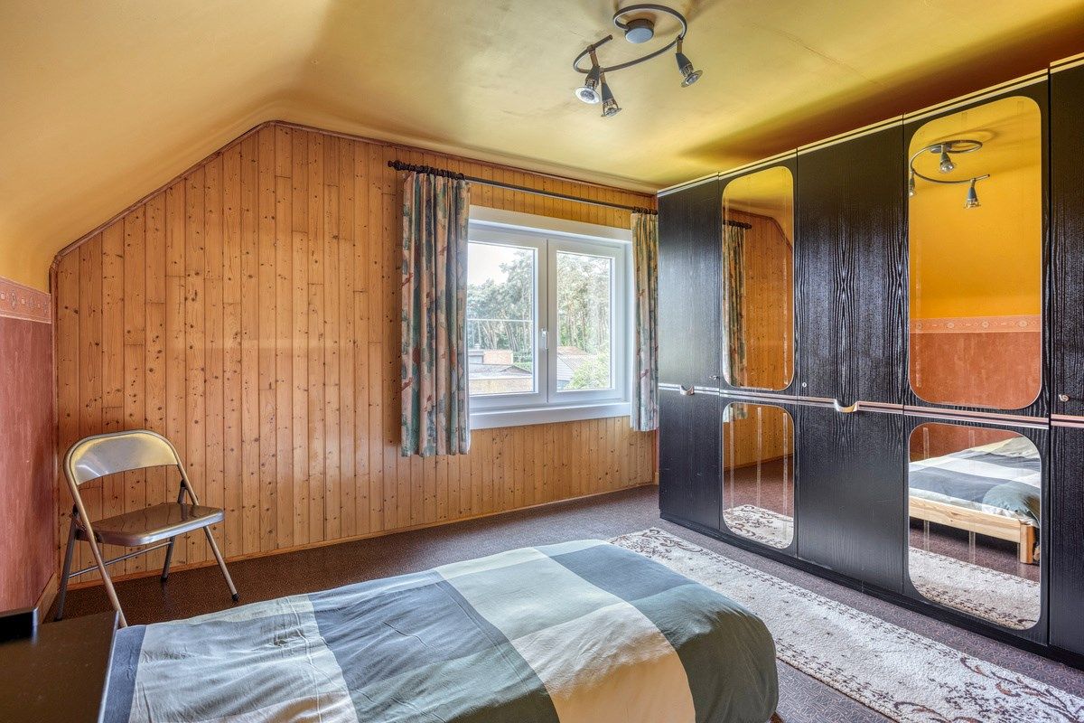 Rustig gelegen woning met oa 4 slpks op een mooi breed perceel van 21 are. foto 21