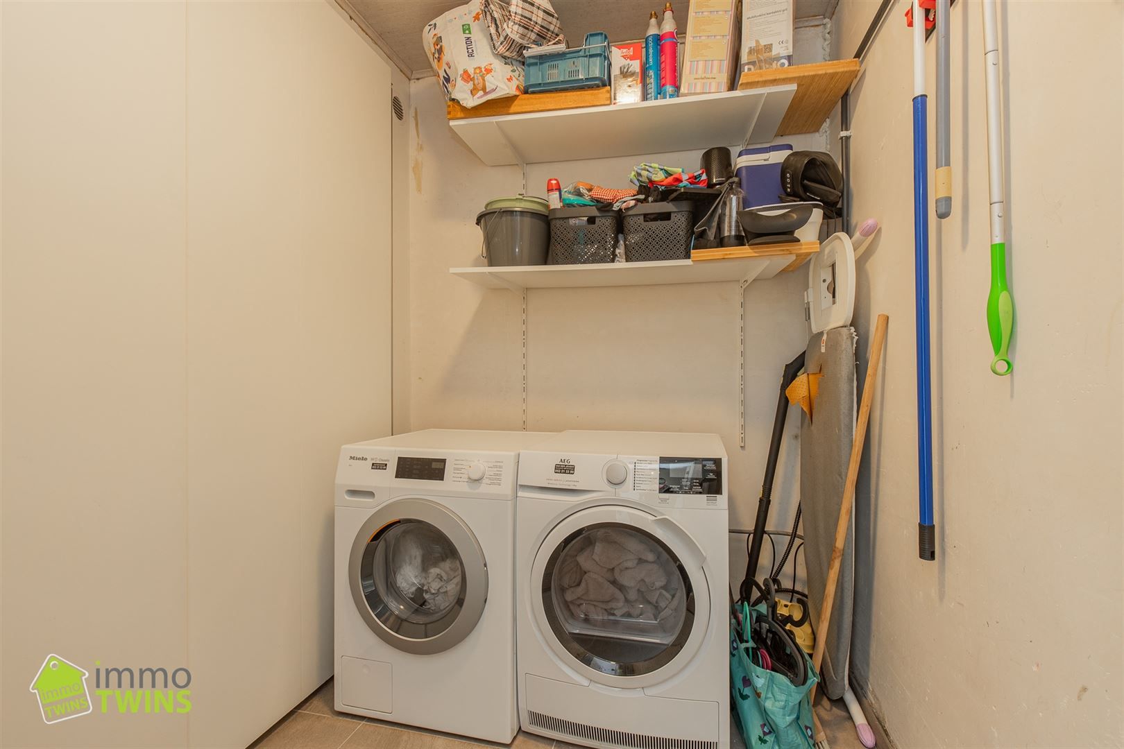 Gezellige open bebouwing met garage, tuin en oprit te Grembergen foto 4