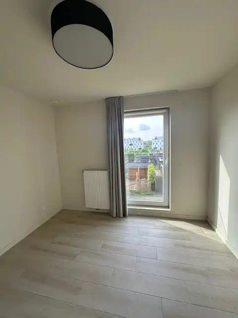 Recent één-slpk app met terras en staanplaats! foto 5