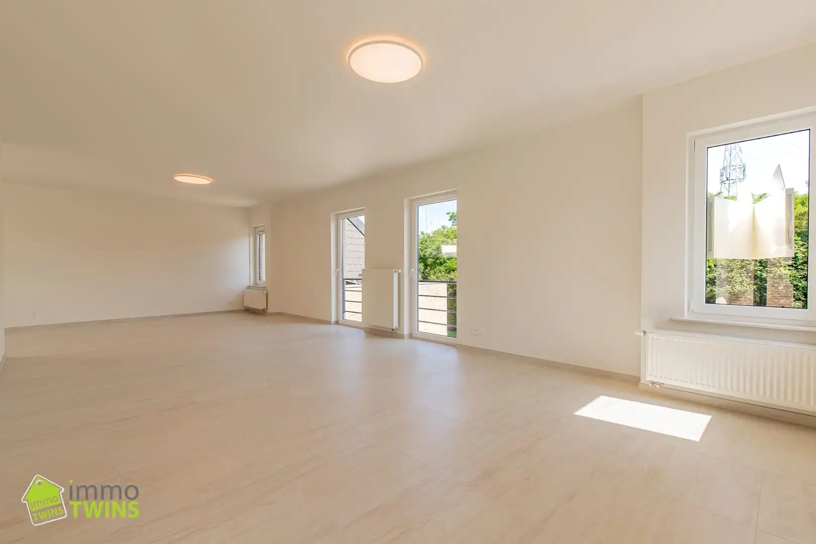 Ruim totaal gerenoveerd appartement van 119 m² met terras, staanplaats en garage te Appels bij Dendermonde foto 4