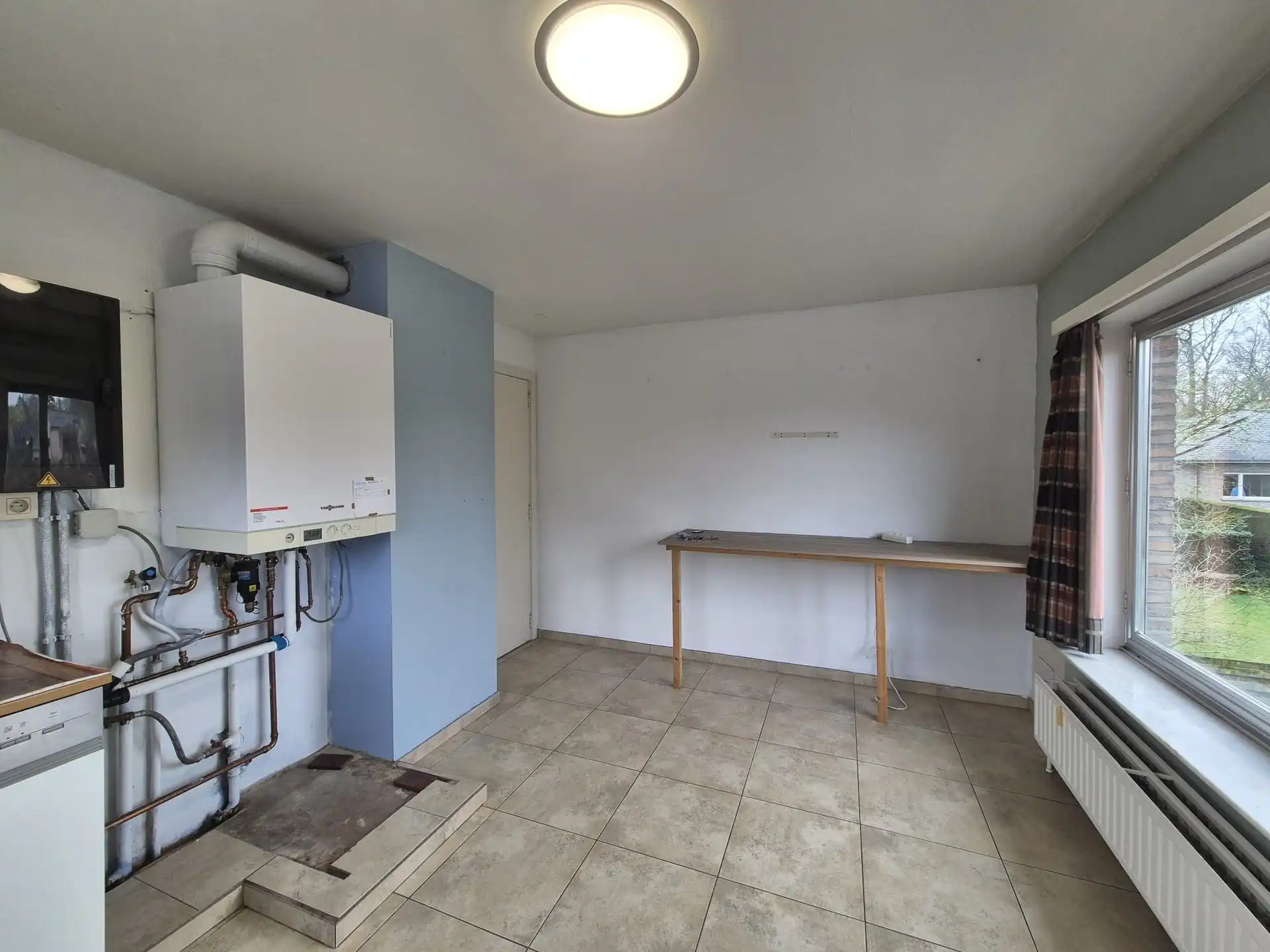 Centraal gelegen ruim appartement met groot zongericht terras en garage. foto 11