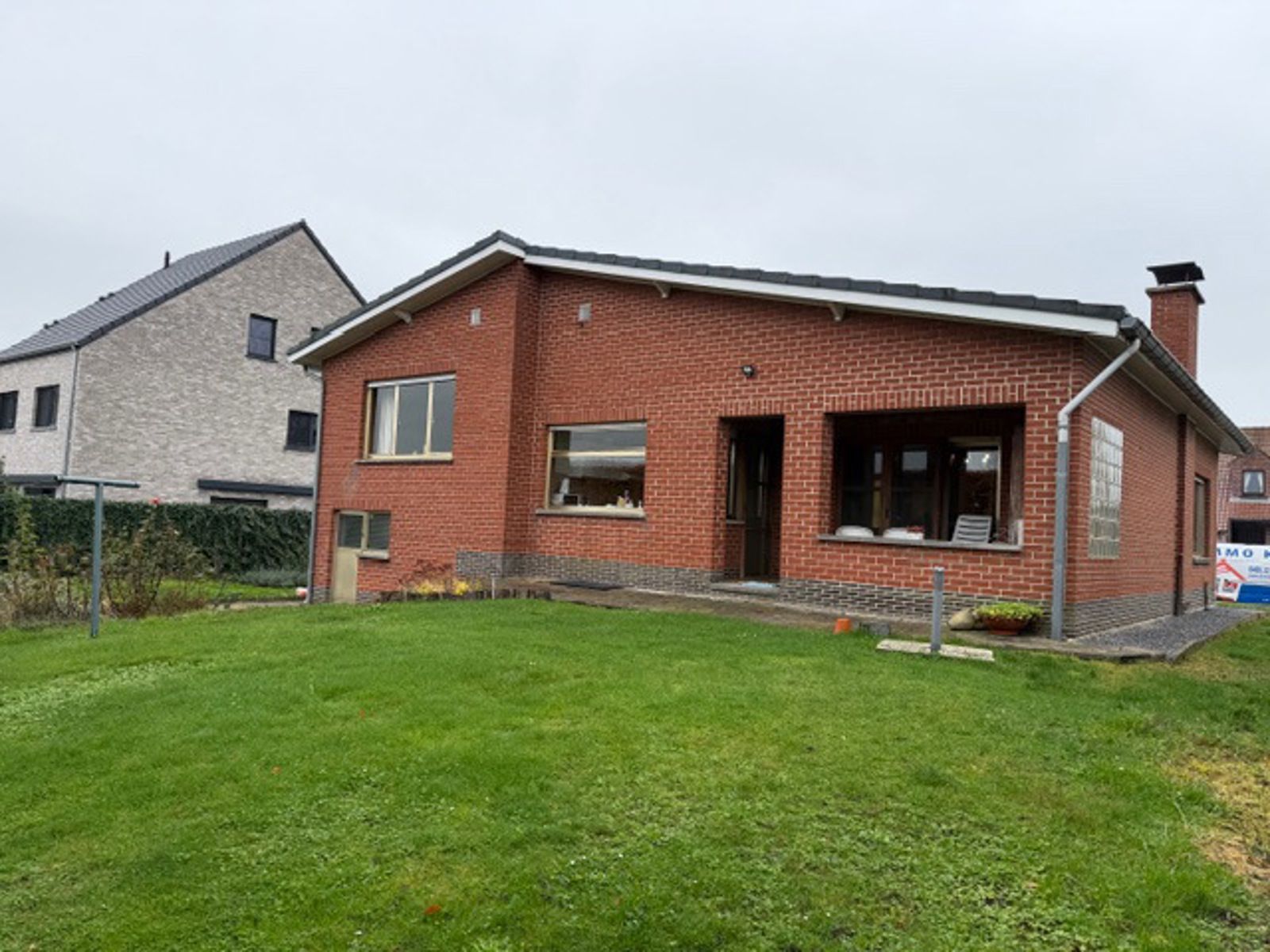 Charmante splitlevelwoning 2 slpks en grote garage te Tienen foto 14