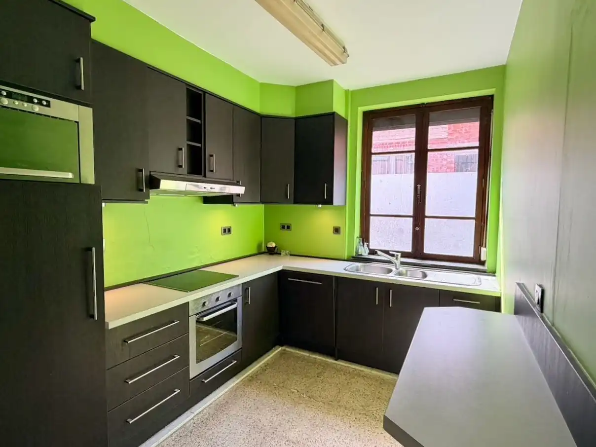 Ruime rijwoning met 4 slaapkamers, garage en tuin op toplocatie in Heverlee foto 5
