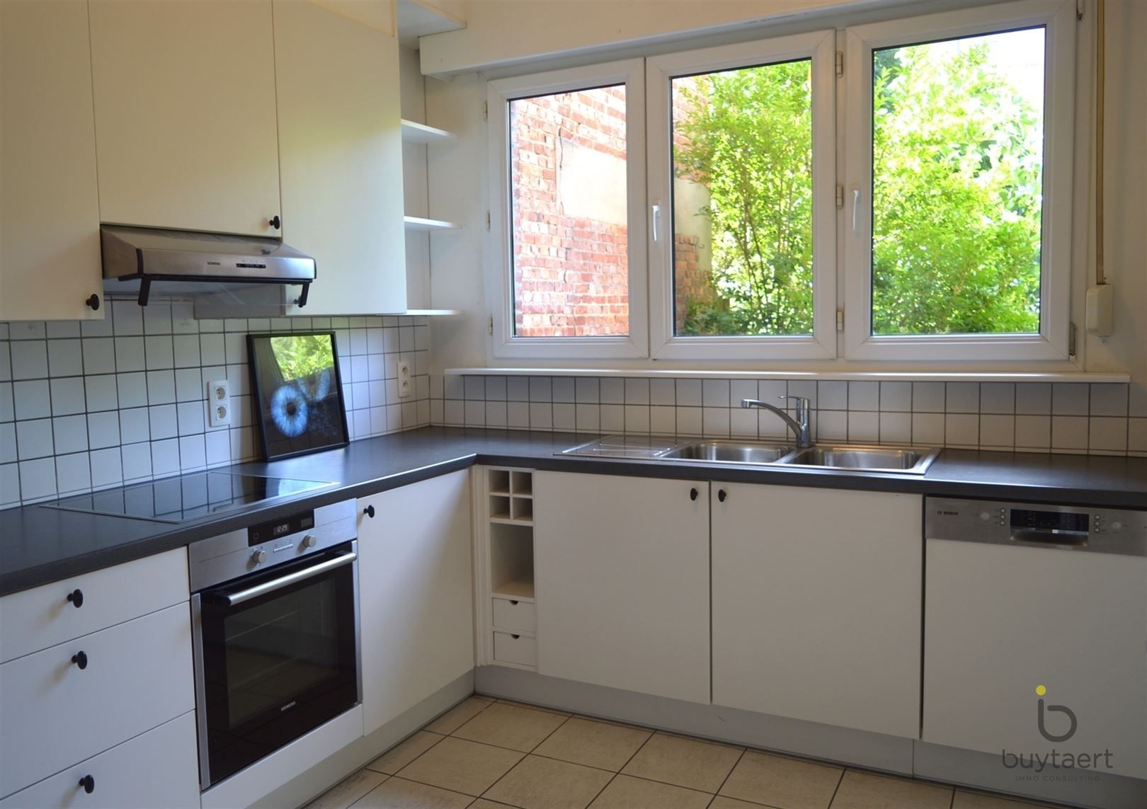 Karaktervolle art deco woning met vier slaapkamers en tuin midden in het welgekende "Pullhof" te Berchem. foto 7