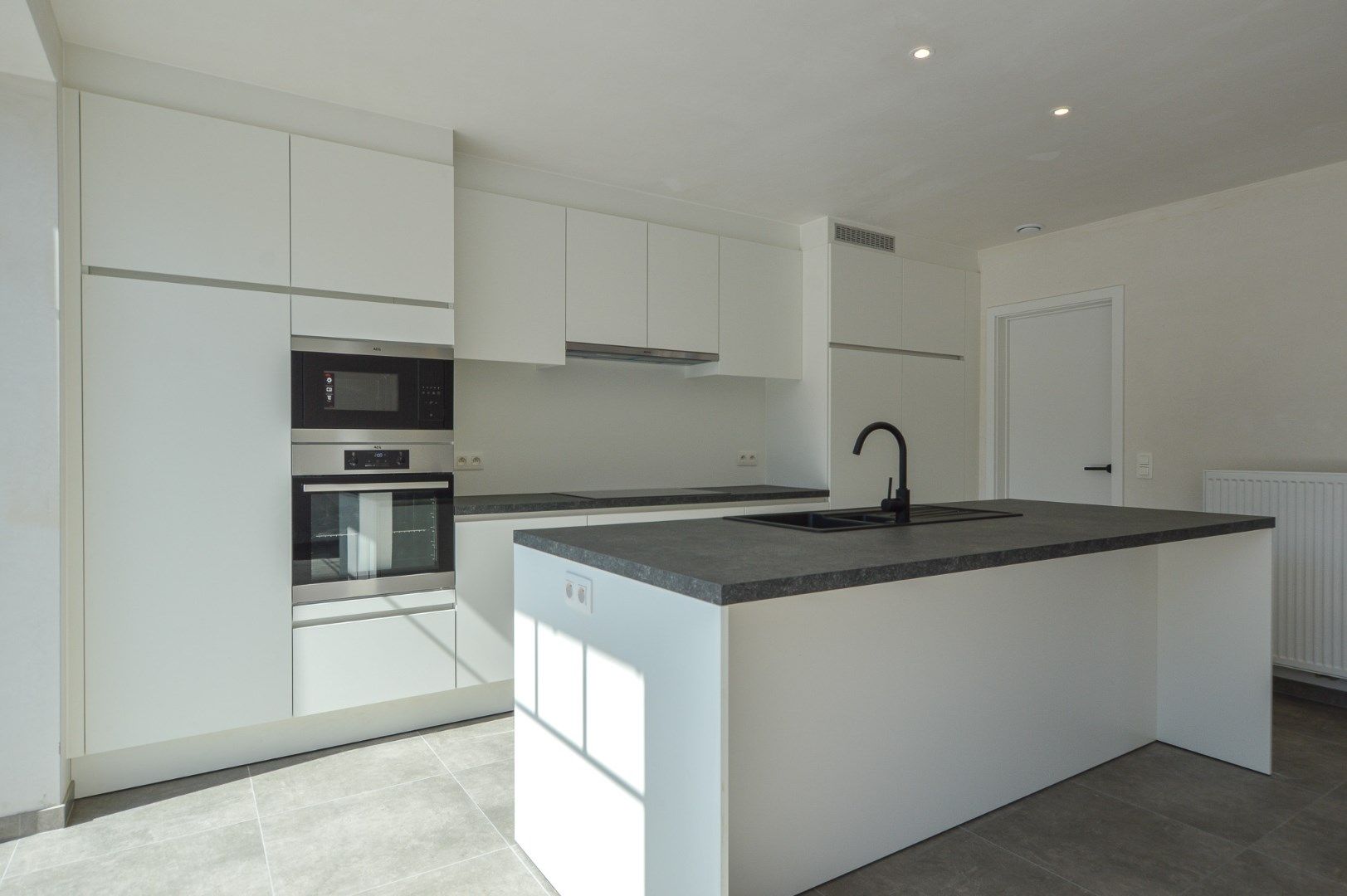 Halfopen nieuwbouwwoning te huur in Roksem.  foto 4