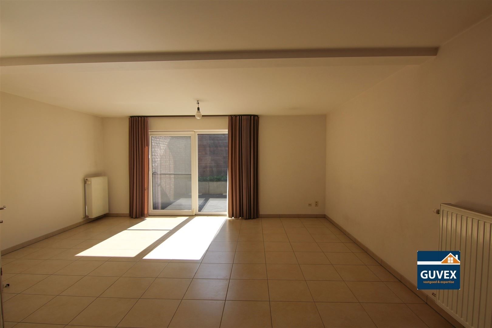 Verzorgd en ruim gelijkvloers appartement te Alken. foto 7
