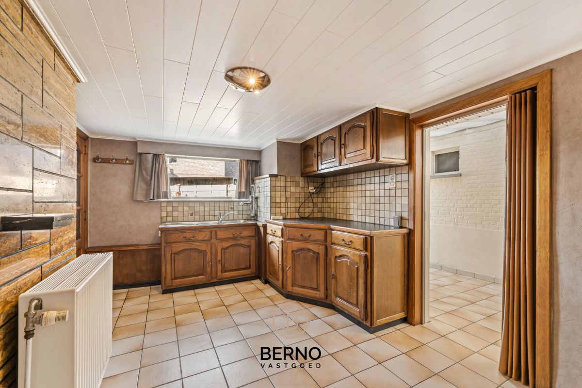 Centraal gelegen woning met tuin en garage. foto 7