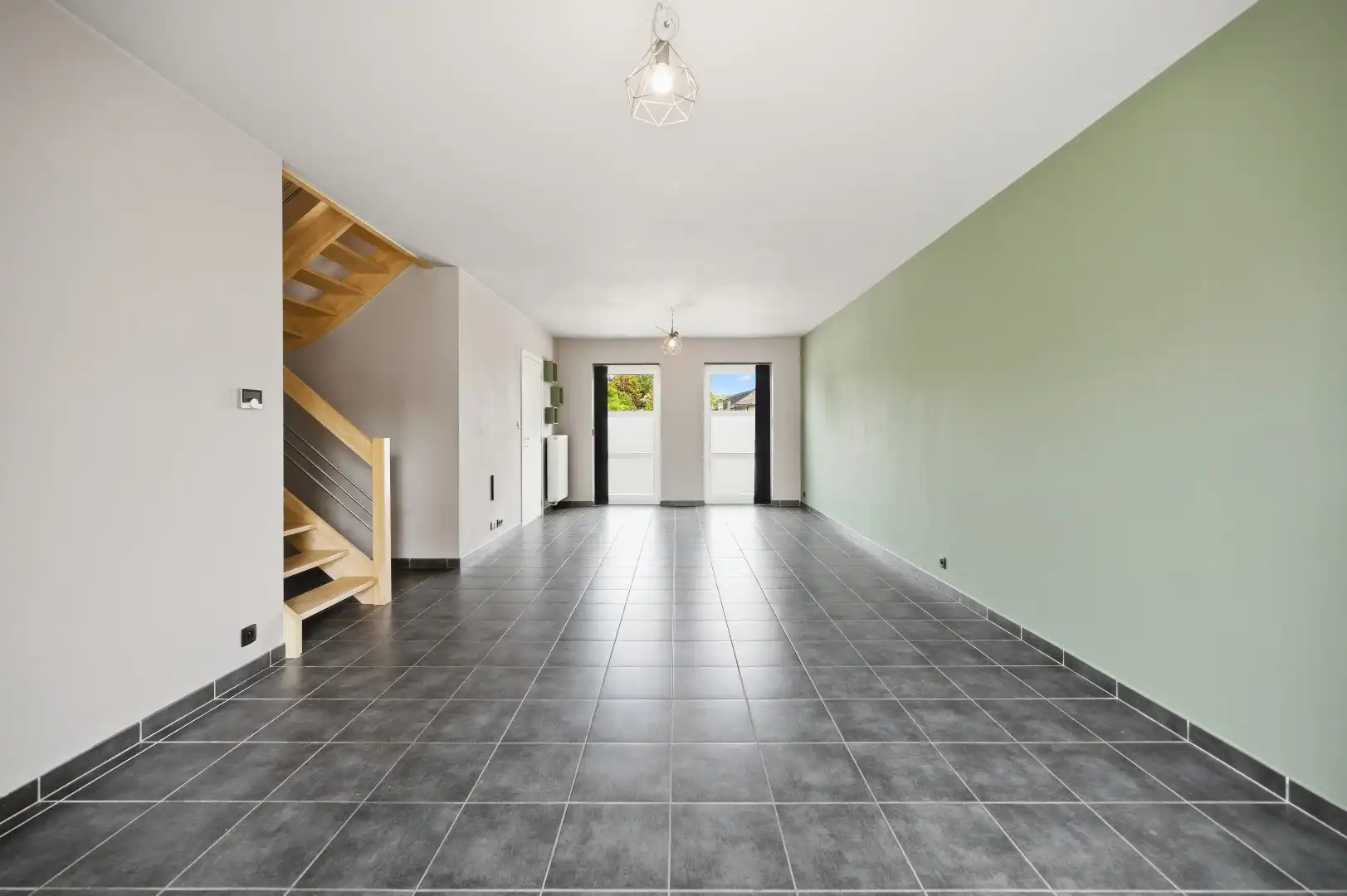 Instapklare rijwoning uit 2009 met 3 slpks, zonnig terras, tuin en 2 autostaanplaatsen foto 11