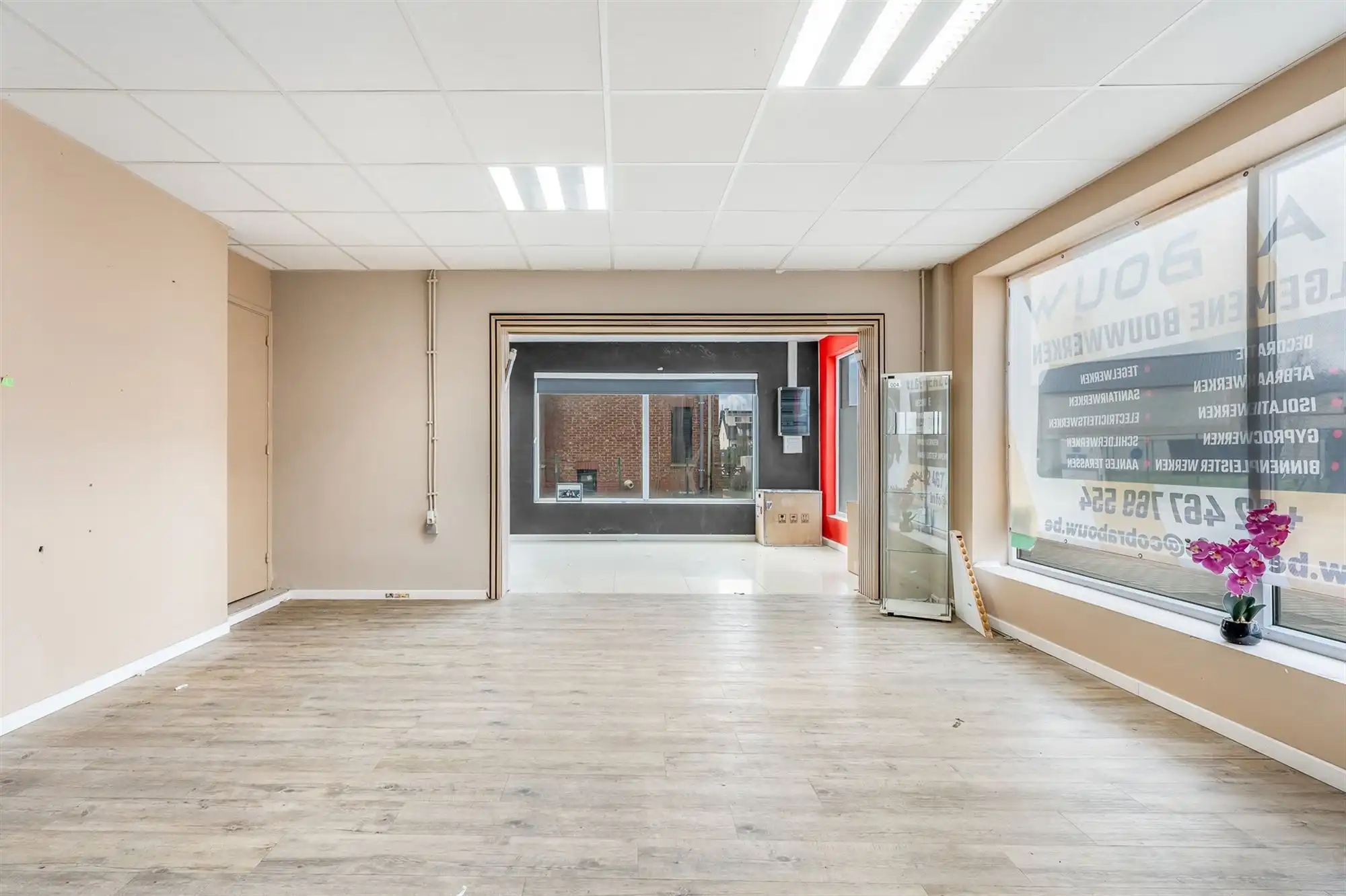 HANDELSHUIS MET RUIM HANDELSPAND EN 2 WOONENTITEITEN OP PERCEEL VAN 9A68CA TE KOERSEL foto 5