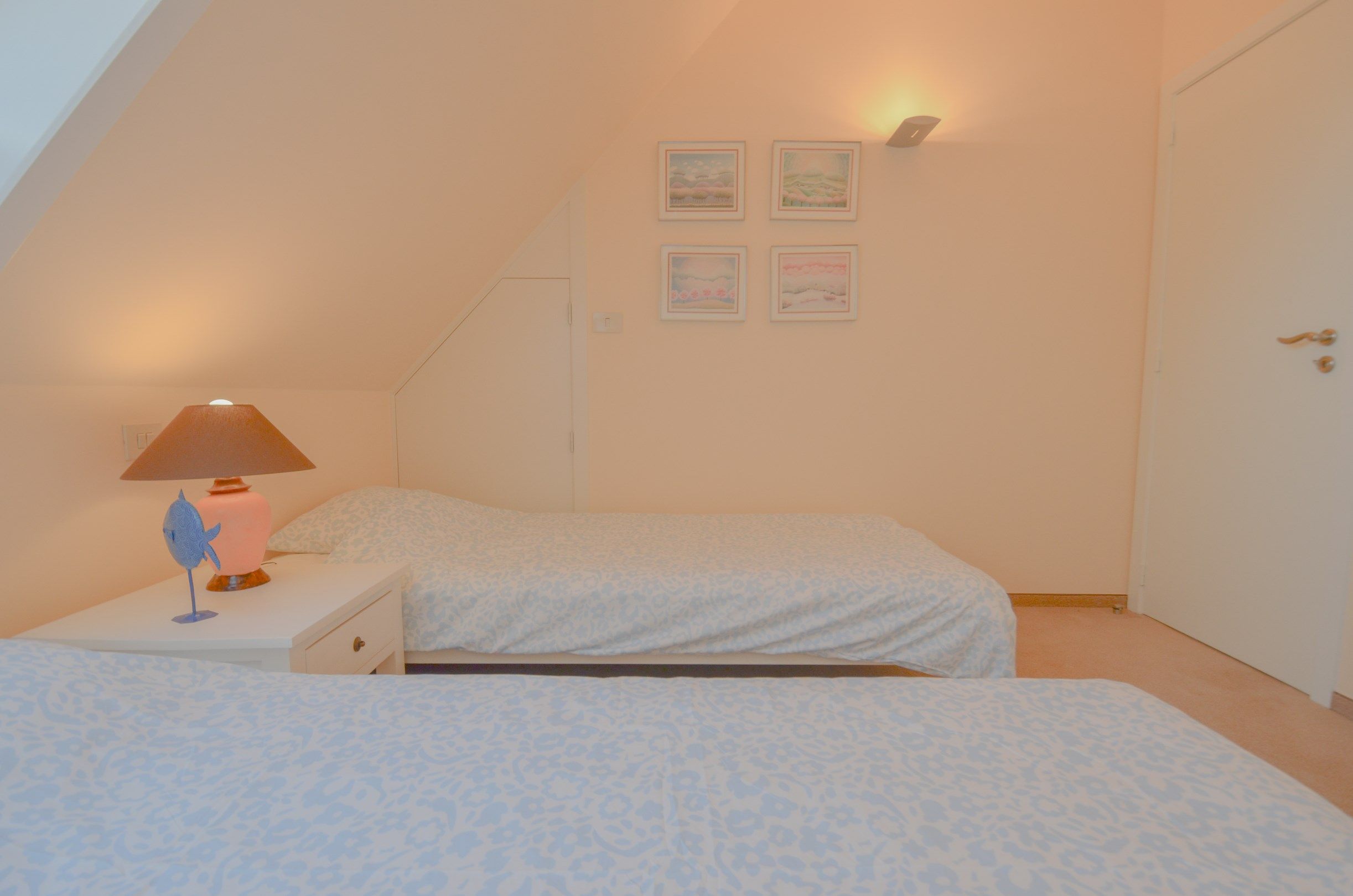 Stijlvol duplexappartement met zonnige terrassen en open zicht op de villa’s van het Zoute. foto 31