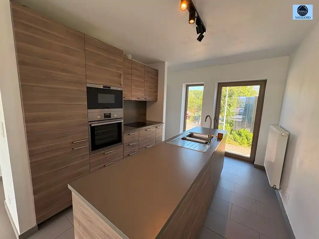 ENERGIEZUINIGE INSTAPKLARE WONING MET 2 SLAAPKAMERS, GARAGE EN TUIN foto 9
