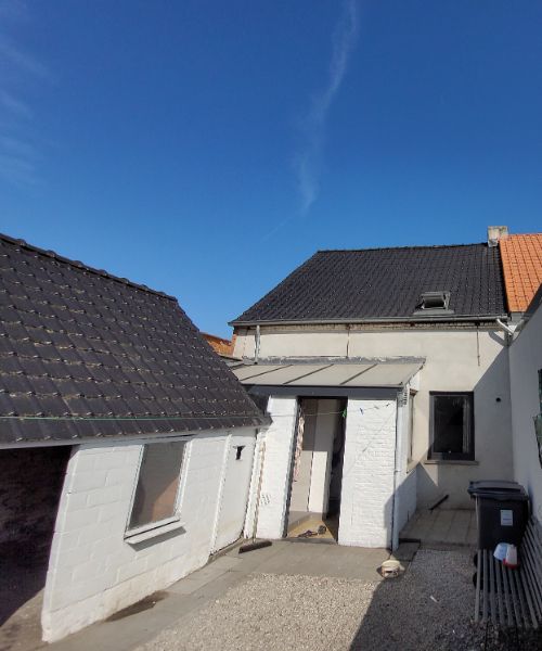 Knusse rijwoning in half-open bebouwing foto 3