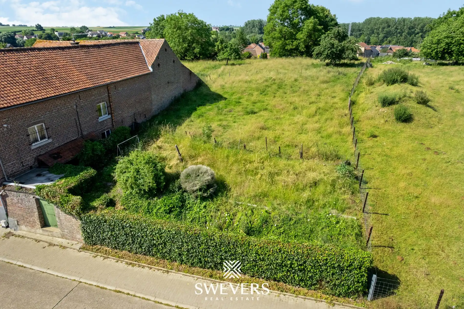 Ruime bouwgrond voor open bebouwing met zuidwestelijke oriëntatie foto 3