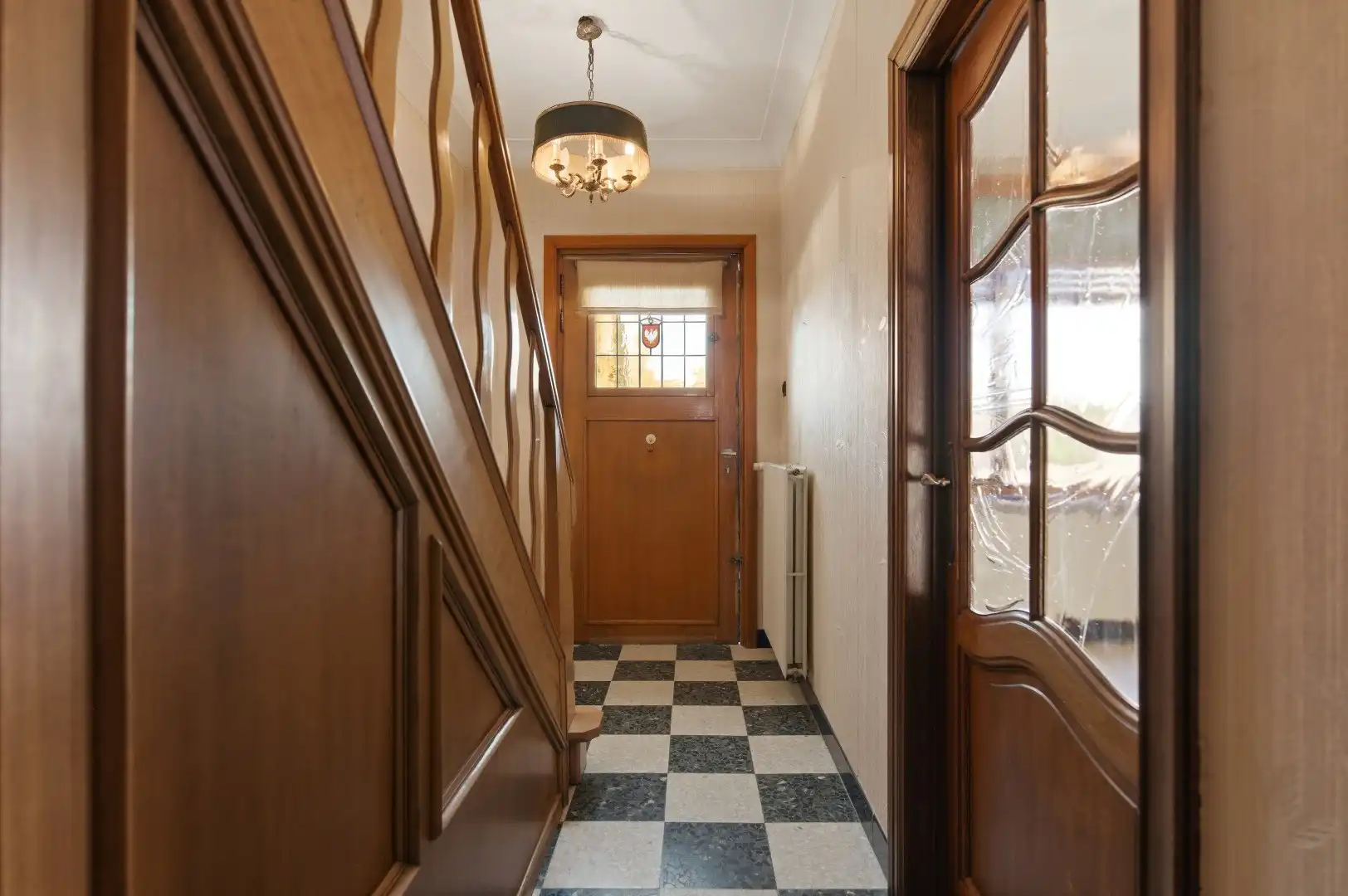 Op te frissen rijwoning met 2 slaapkamers en ruime tuin in Tienen foto 4