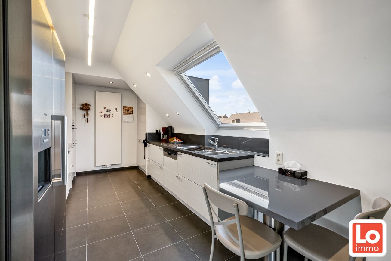 Mooi dakappartement met 3 slaapkamers, 2 badkamers, 2 terrassen (18m² & 5m²) en garagebox foto 5