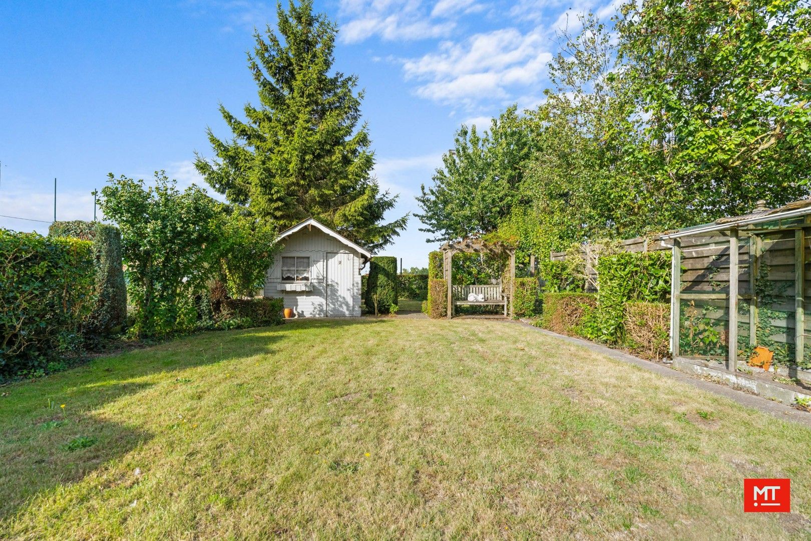 Te renoveren alleenstaande woning met 3 slaapkamers, Westgerichte tuin en garage in het centrum van Passendale foto 16