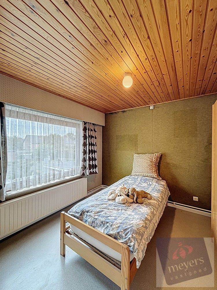 Ruime halfopen gezinswoning met tuin en garage in Hasselt foto 12