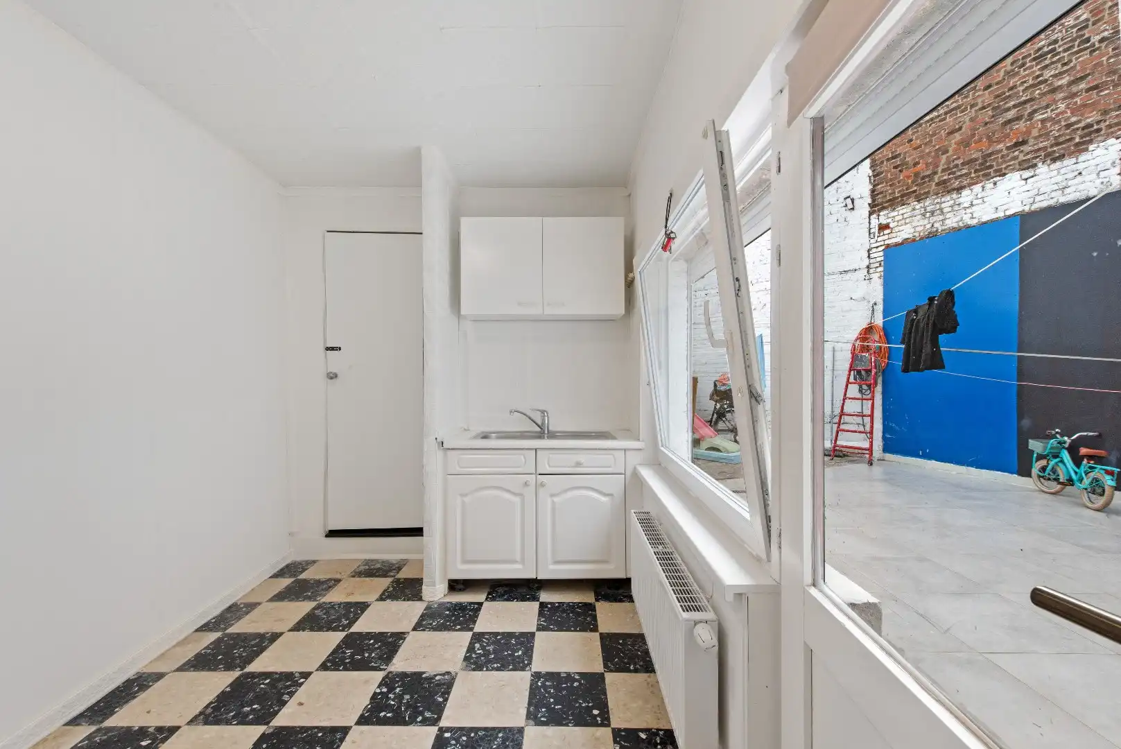 Polyvalente rijwoning met grote handelsruimte te Tienen foto 19