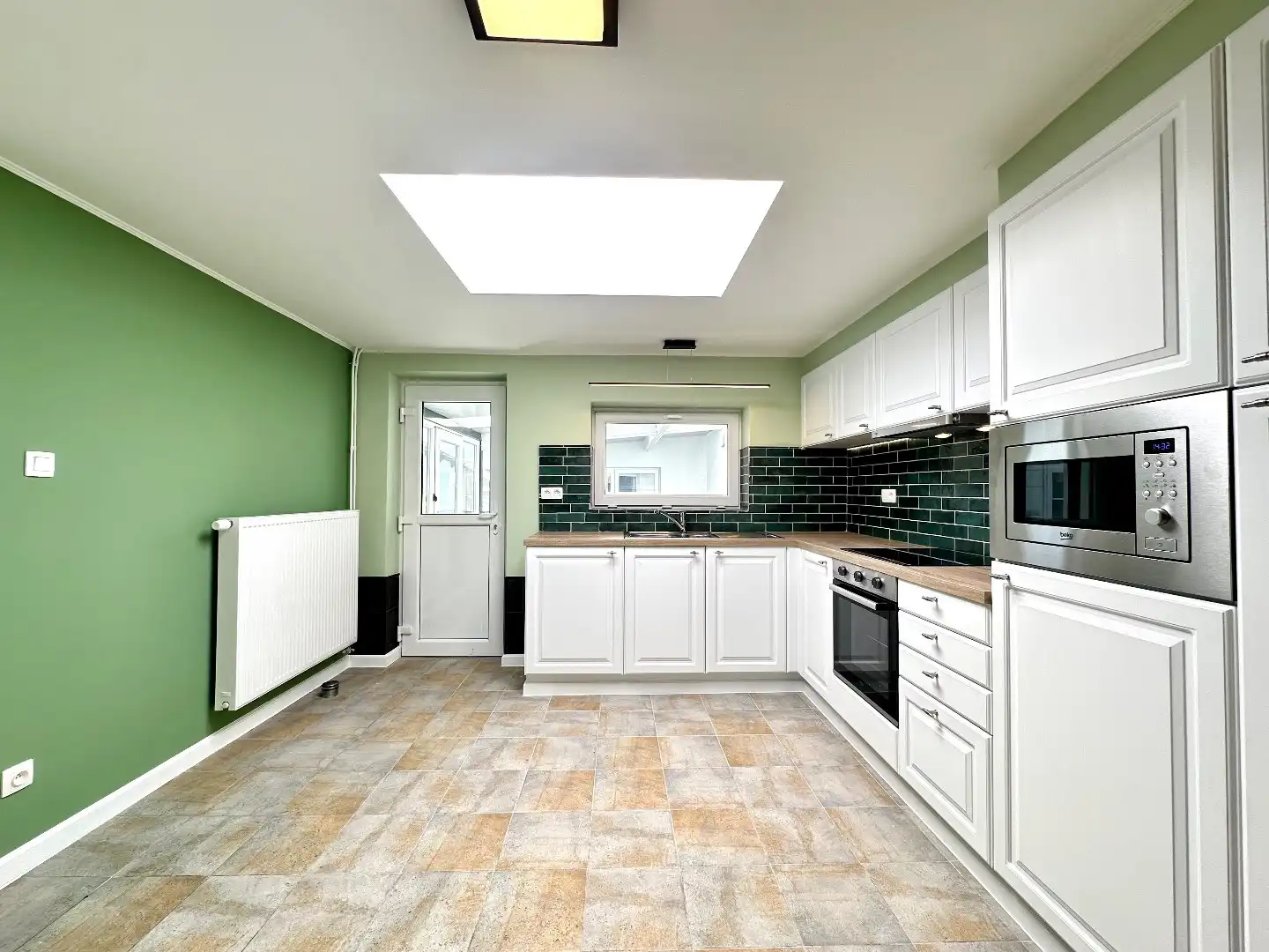 Ruime en gerenoveerde gezinswoning met 3 slaapkamers en veel comfort foto 5