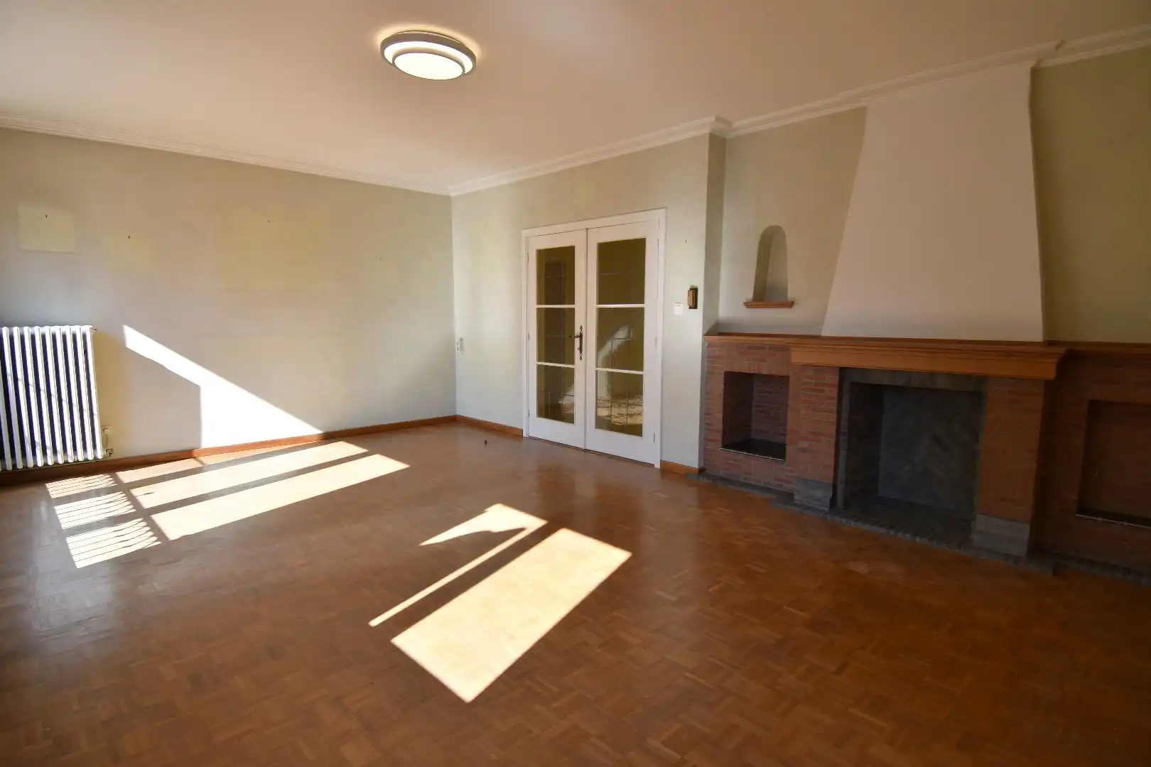 Ruim 3-slaapkamer appartement met garage in hartje Kortrijk foto 4