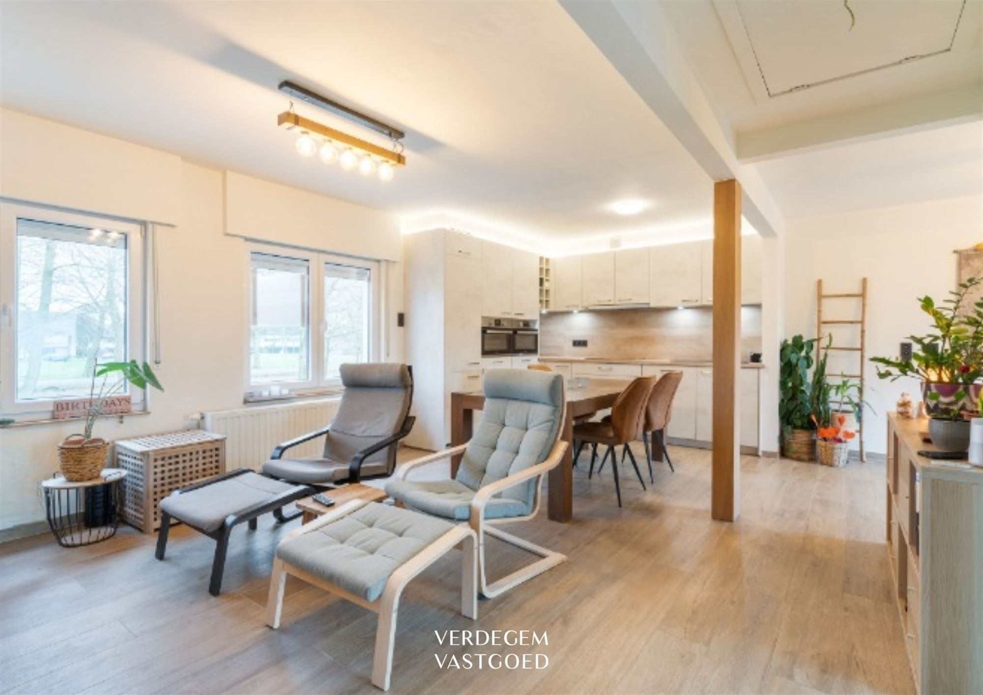 Wonen en werken op een unieke locatie: handelsgelijkvloers met appartement en tuin foto 18