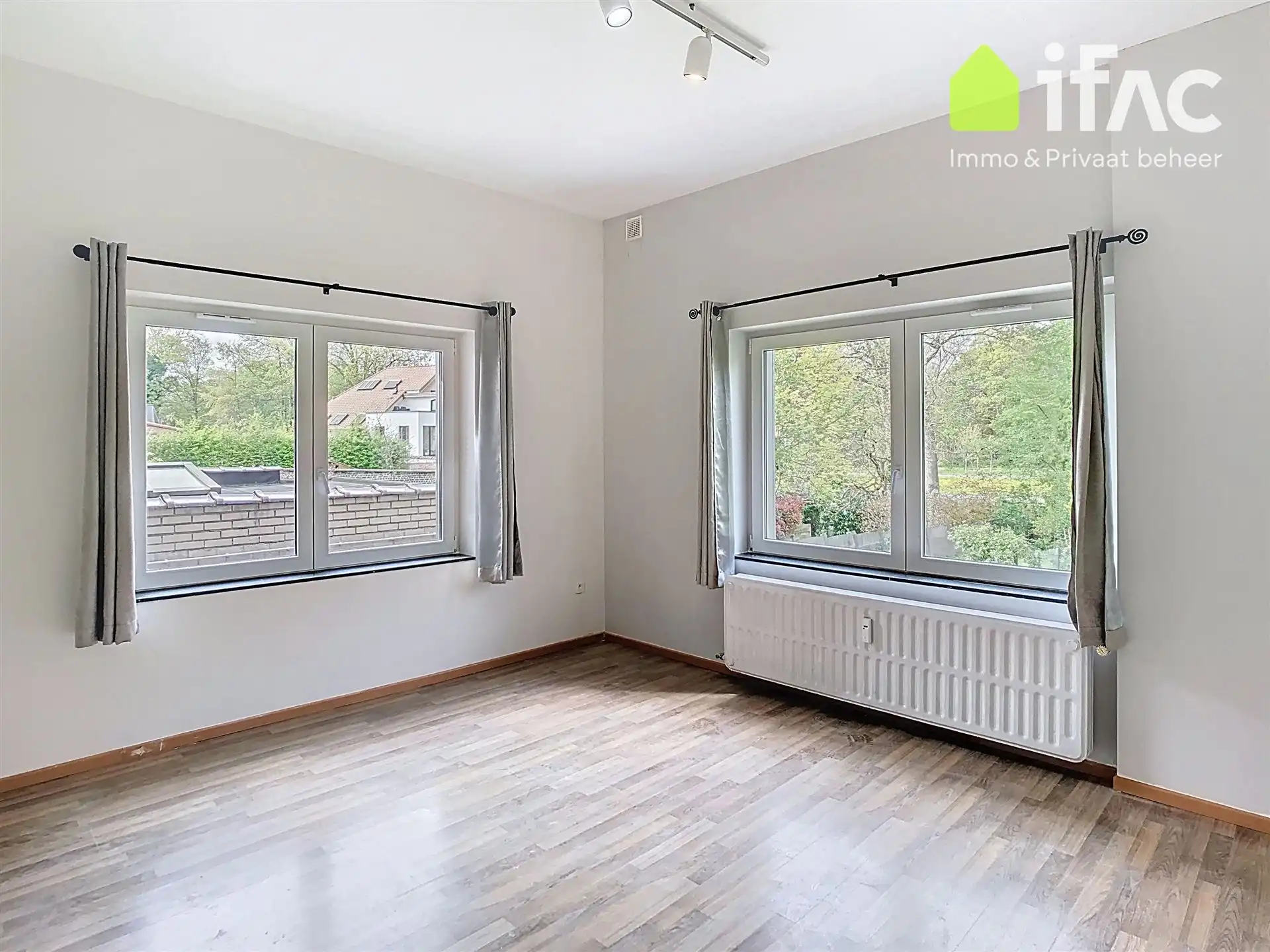 Ruim gelijkvloers appartement met tuin foto 13