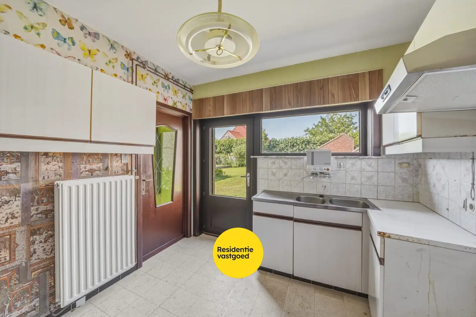 Ruime halfopen woning met 4 slaapkamers, tuin en garage foto 11
