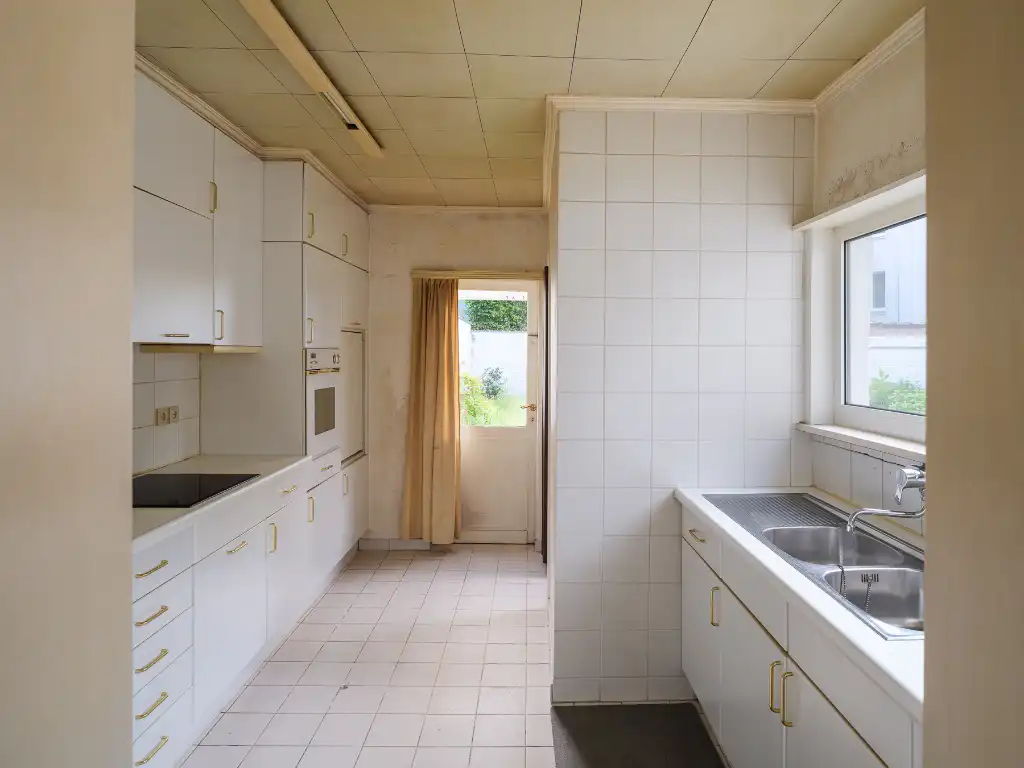 Karaktervolle interbellumwoning met uitzonderlijke stadstuin nabij de Coupure foto 11