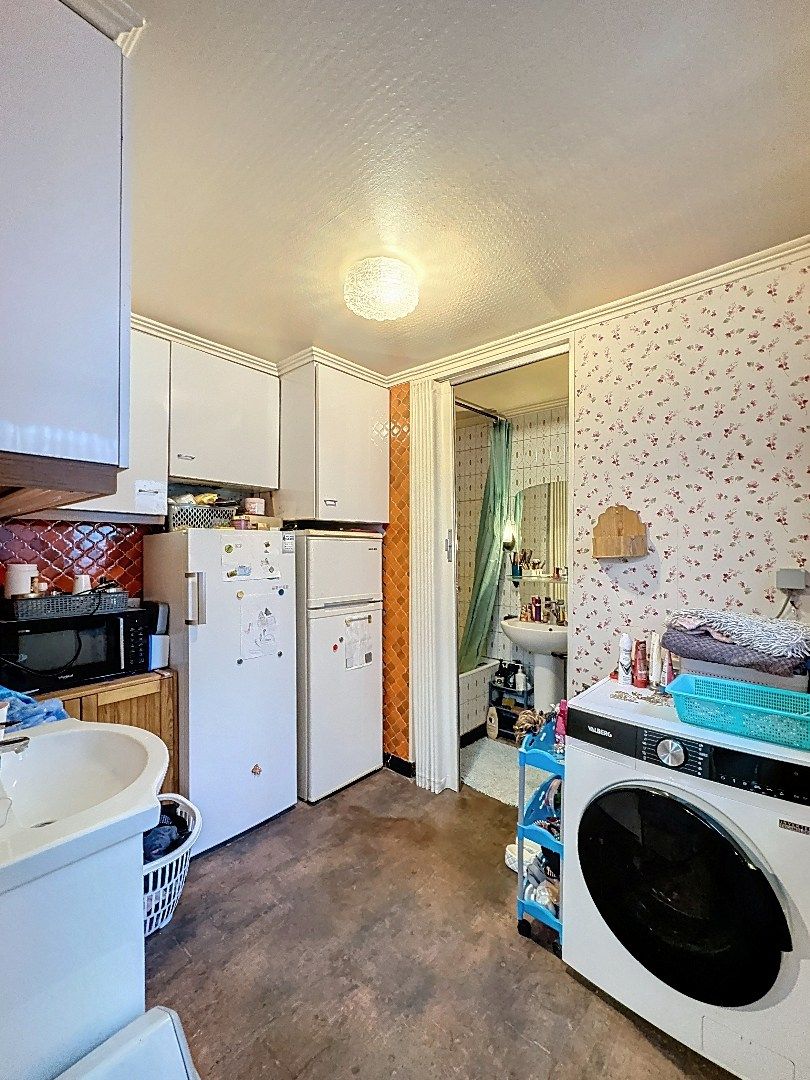 Gezellig wonen in Tienen: praktische rijwoning met terras en 3 slaapkamers foto 9