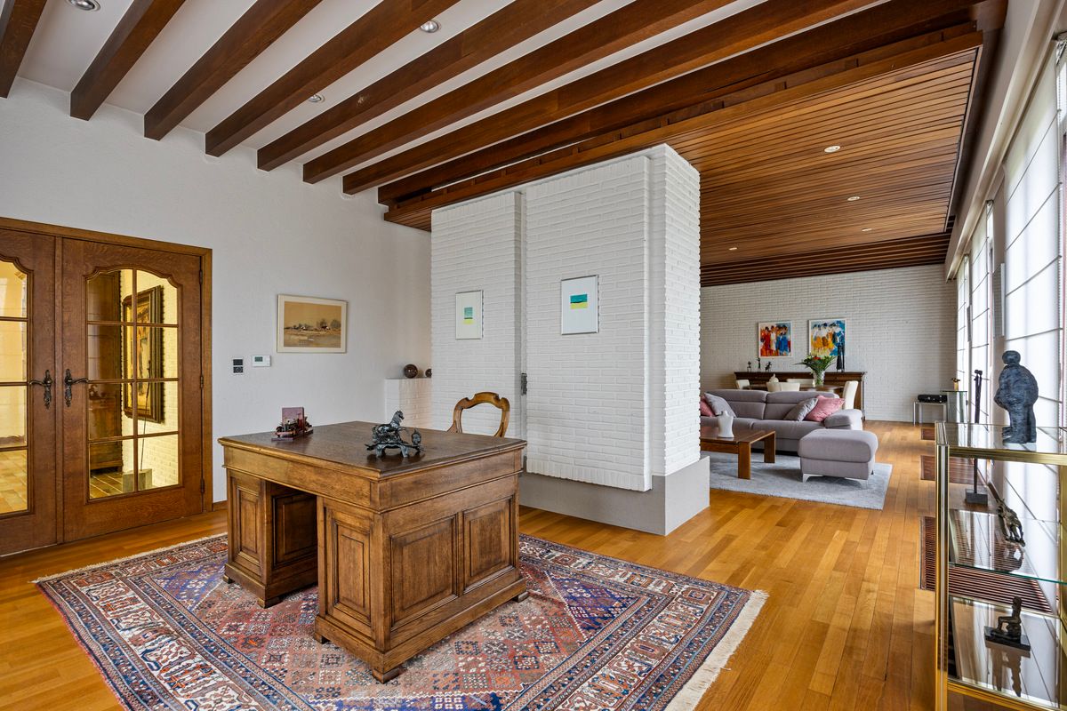 Ruime gelijkvloerse woning met bedrijfshal foto 10
